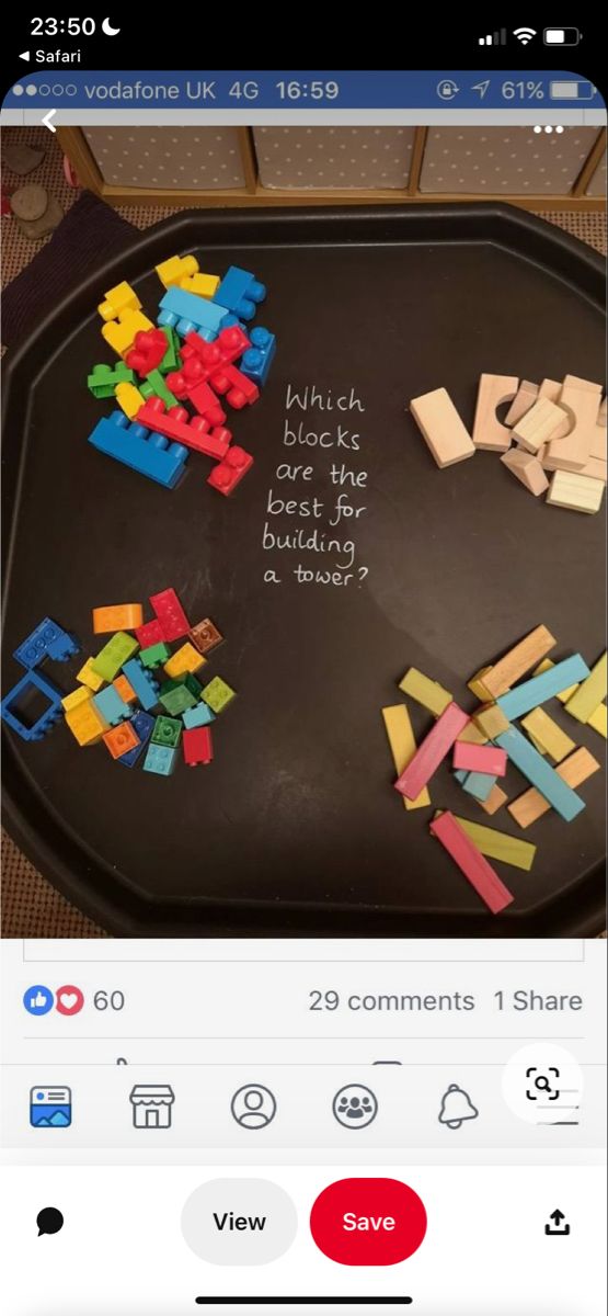 a black table topped with lots of blocks and magnets on it's side