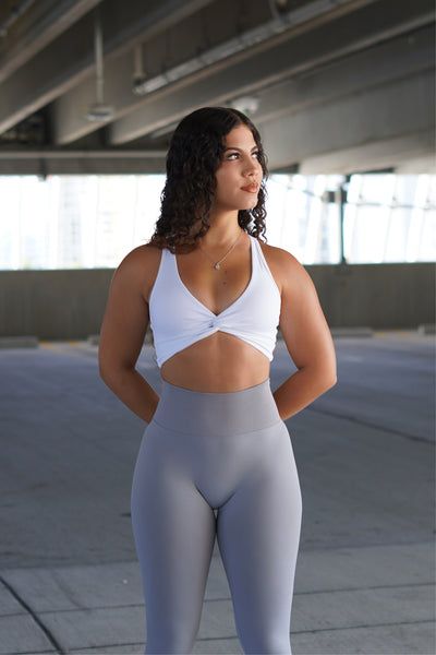 Impact Sports Bra - White – KATA ACTIVE Sporty 4-way Stretch Squat Proof Sports Bra, Sporty Squat Proof Sports Bra With 4-way Stretch, Gray Sports Bra With Built-in Bra For Pilates, White Athleisure Bra For Workout, Squat Proof 4-way Stretch Sports Bra For Gym, Squat Proof 4-way Stretch Sports Bra For Workout, Athleisure Sports Bra For Light Exercise, Squat Proof, Workout Bra With Light Support, Athleisure Workout Bra With Seamless Construction