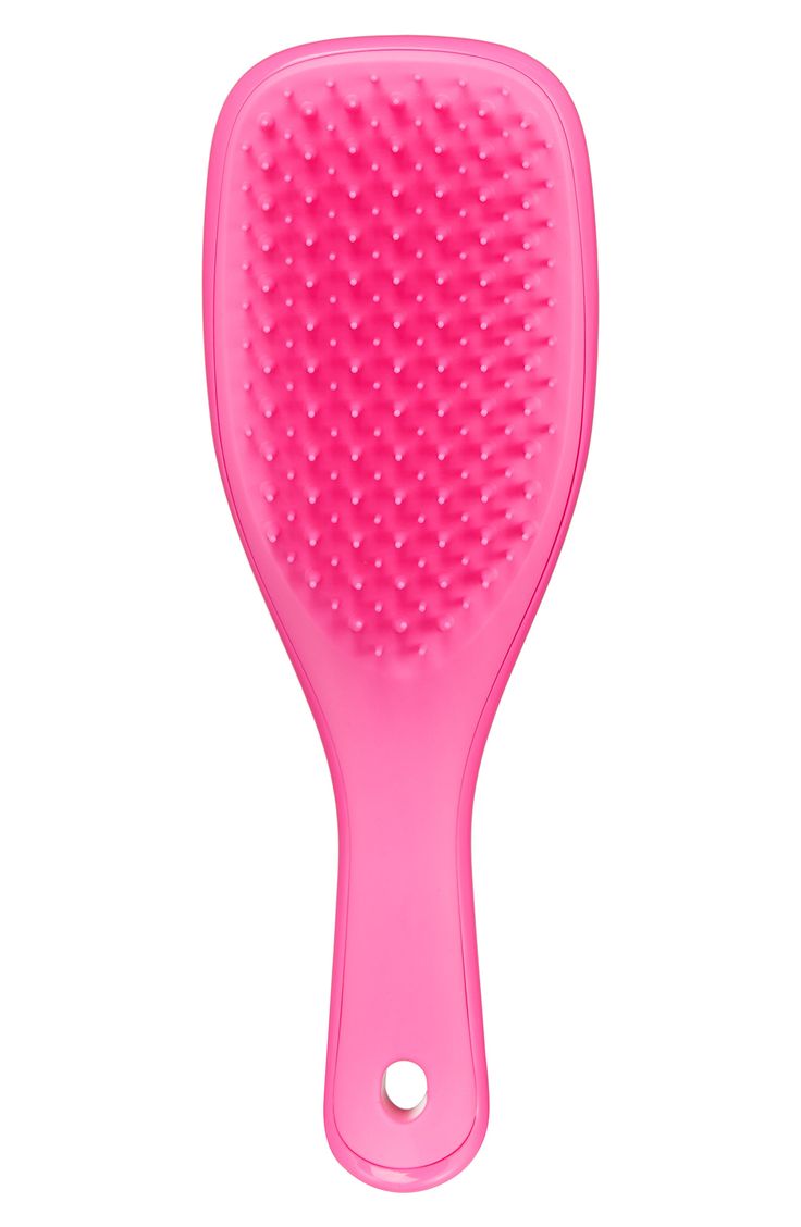 What it is: A detangling hairbrush in a travel size designed specifically for use in the shower, featuring a handle and no-slip design. What it does: This brush detangles without pulling, tugging or snagging hair. Its teeth glide effortlessly through all types of wet hair, making for an easy and painless experience. Plastic Made in the UK Cute Mini Hair Brush, Preppy Hair Stuff, Good Hair Brushes, Mini Tangle Teezer, Preppy Hair Products, Good Hair Products, Mini Hairbrush, Preppy Items, Period Bag