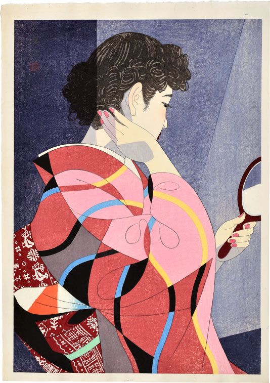 a woman in a kimono holding a mirror and looking at her reflection on the mirror