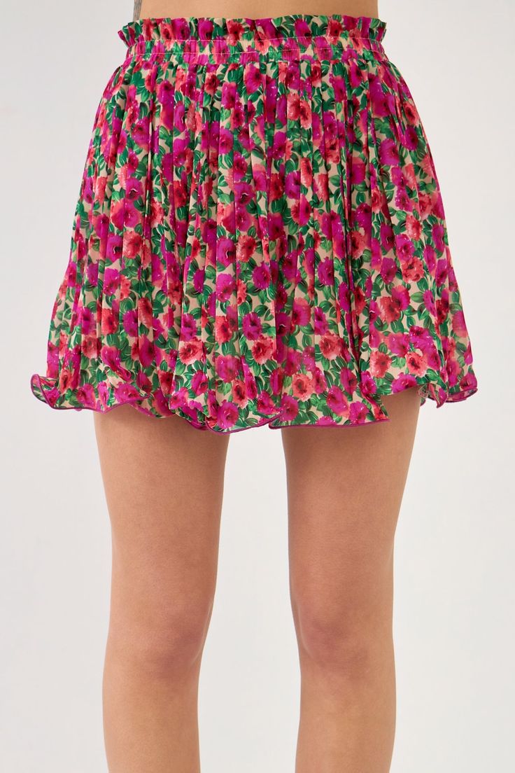 This Floral Pleated Elastized Skirt is the perfect skirt for any occasion. The elastic waist provides a comfortable and flattering fit, while the pleated skirt adds a touch of elegance. The skirt is lined for a smooth and comfortable fit, and the fishwire finish gives it a unique and stylish look. The mini length makes it perfect for a night out or a day at the office. Floral Elastic waist Pleated Lined Fishwire finish Mini Hand wash cold Do not bleach Do not tumble dry Iron low Shell: 100% Poly Chic Flowy Skirt With Elastic Waistband, Spring Flowy Skirt With Elastic Waistband, Flowy Lined Pleated Skirt For Spring, Spring Flowy Skirt With Pleated Hem, Spring Midi Pleated Skirt With Elastic Waistband, Spring Tiered Pleated Skirt With Elastic Waistband, Day Out Pleated Flowy Skirt, Chic Summer Tiered Pleated Skirt, Feminine Tiered Pleated Skirt For Spring