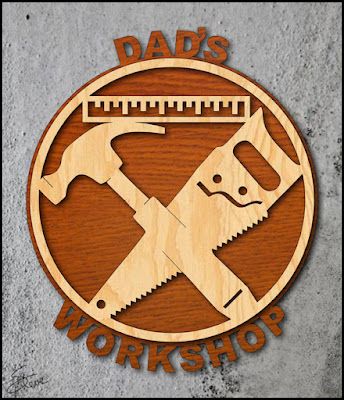 a wooden sign that says dad's workshop with two tools on top of it