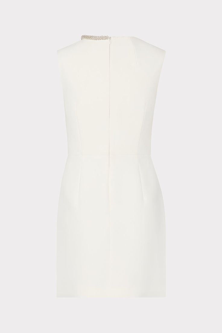 The Nyra sleeveless dress is hits at a party-ready mini length. For a touch of subtle sparkle, its crew neckline is embellished in crystal. It’s finished with a back zipper to close. Mini Sleeveless Dress With Back Zipper For Cocktail, Elegant Sheath Mini Dress With Side Zipper, Elegant White Mini Dress With Side Zipper, Elegant A-line Mini Dress With Side Zipper, Embellished Mini Workwear Dresses, Embellished Mini Dress For Casual Workwear, White Embellished Dress For Work, Embellished Mini Dress For Work, White Embellished Workwear Dress