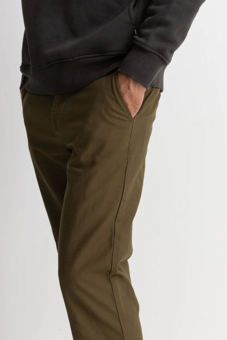 Classic Fatigue Pant in Olive The Classic Fatigue Pant in Olive is a sophisticated take on the classic military look. Made from heavy-duty washed cotton twill, it offers durability and comfort. Featuring side and dual back welt pockets, fixed waist, and straight leg with a slight taper, it combines function and style in a tasteful and exclusive design. Military Looks, Night Tops, Cami Tanks, Denim Shop, Welt Pockets, Welt Pocket, Exclusive Designs, Cotton Twill, Style Me