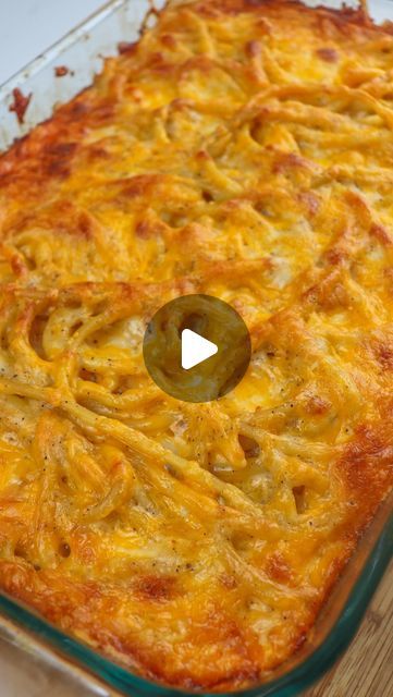 a casserole dish with cheese and onions in it