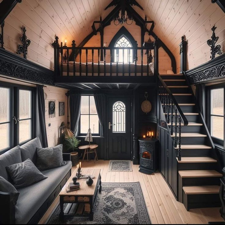 a living room filled with furniture and a stair case