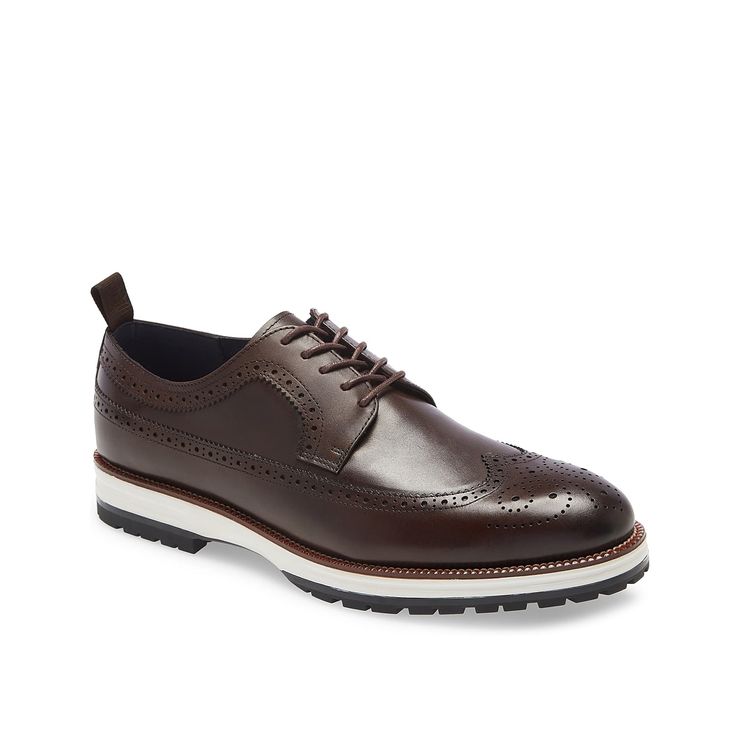 Ike Behar-Louis Wingtip Oxford The Louis wingtip oxford from Ike Behar rocks a versatile design that will pair with any casual or tailored look. The classic leather upper is lifted with a sporty sole for a modern update. Wingtip Oxford Lace-up Shoes With Textured Sole, Leather Wingtip Lace-up Shoes For Business Casual, Masculine Lace-up Shoes With Brogue Detailing, Masculine Wingtip Lace-up Shoes With Rubber Sole, Workwear Wingtip Oxfords With Contrast Sole, Brown Wingtip Sneakers For Business, Wingtip Oxfords With Contrast Sole For Work, Masculine Brogue Oxfords Lace-up, Masculine Lace-up Oxfords With Brogue Detailing