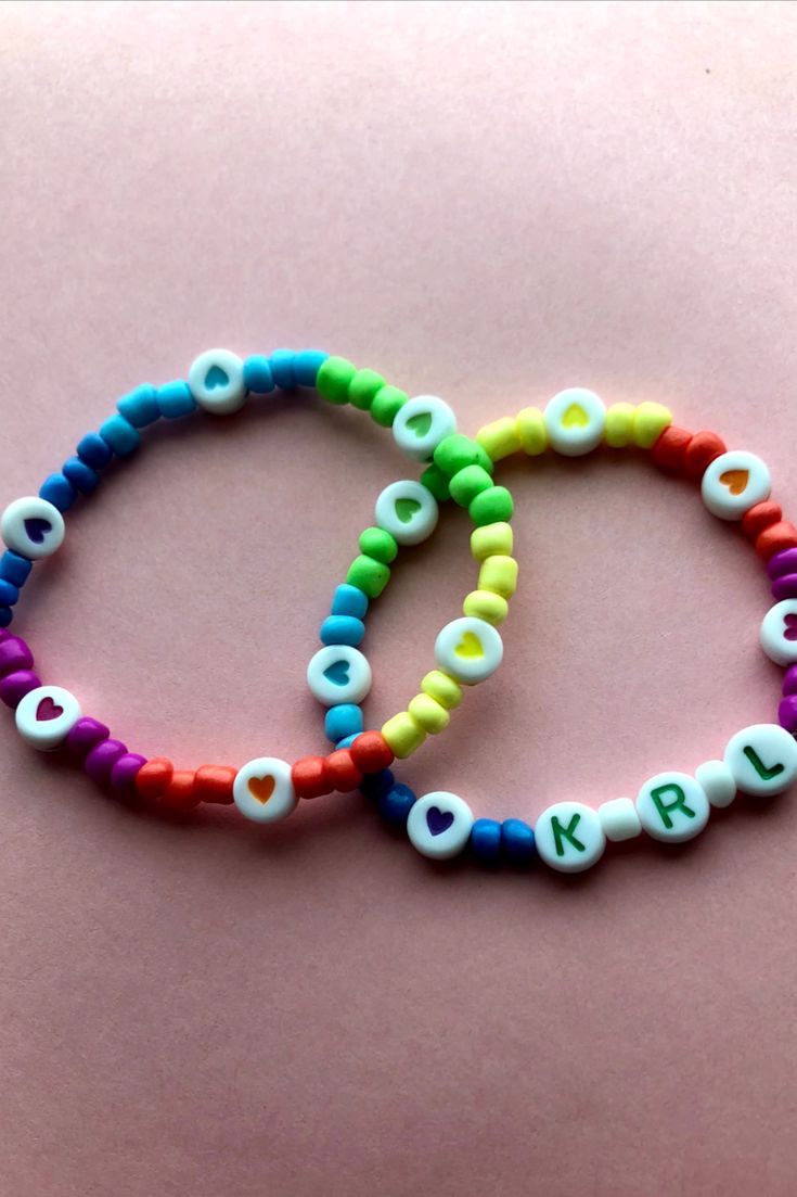 https://www.etsy.com/listing/932502575/personalized-bracelets-round-initial?ref=shop_home_active_15 Hypoallergenic Rainbow Beaded Bracelets For Friendship, Fun Personalized Colorful Bracelets, Colorful Personalized Jewelry For Friendship, Hypoallergenic Rainbow Beaded Bracelet For Friendship, Personalized Colorful Friendship Bracelets, Cute Rainbow Friendship Bracelets For Everyday, Fun Rainbow Friendship Bracelets, Customizable Adjustable Rainbow Jewelry, Colorful Personalized Friendship Jewelry