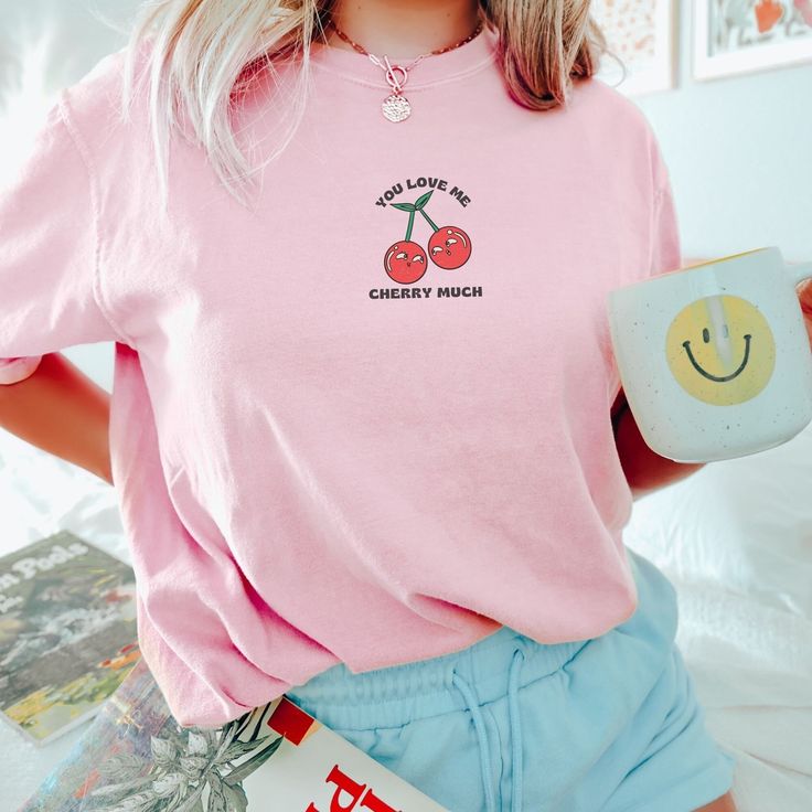 🩴 Cherries Shirt.  You Love Me Berry Much! 🩴 Click here to view our shop for more great designs --- https://www.etsy.com/shop/GraceAndFlipFlops Click on the ❤️ to see our new designs as they arrive. 🩴 Comfort Colors T-Shirt - The unisex cotton tee is the perfect staple of any wardrobe. The Unisex relaxed fit makes it an excellent daily choice. 🩴 Sizing - See listing image for a specific sizing chart for this style. Please note these are unisex style, and therefore have a more relaxed fit. If Cute Cotton Shirt With Letter Print, Cute Short Sleeve Shirt With Slogan, Cute Short Sleeve Shirt With Text Print, Cute Relaxed Fit Slogan Shirt, Cute Screen Print Tops For School, Cute Graphic Print Tops For School, Cute Slogan Tops For School, Cute Text Print Tops For School, Kawaii Cotton Tops For School