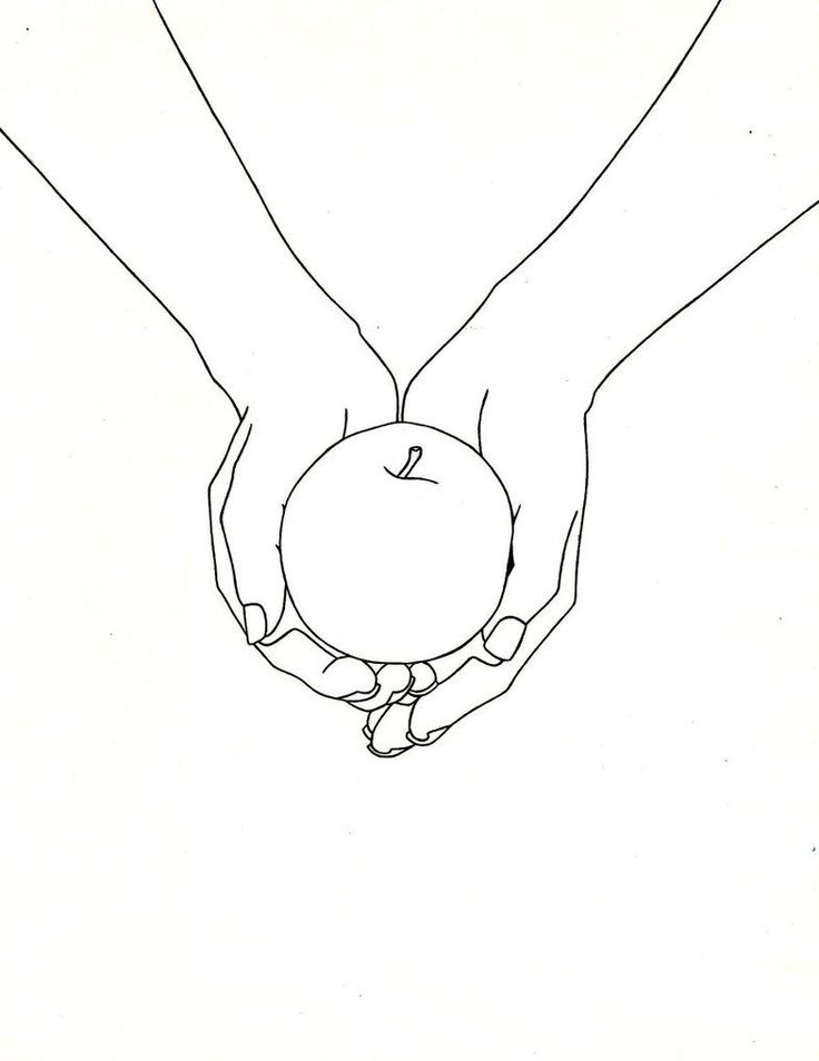 two hands holding an apple in the shape of a heart on top of each other