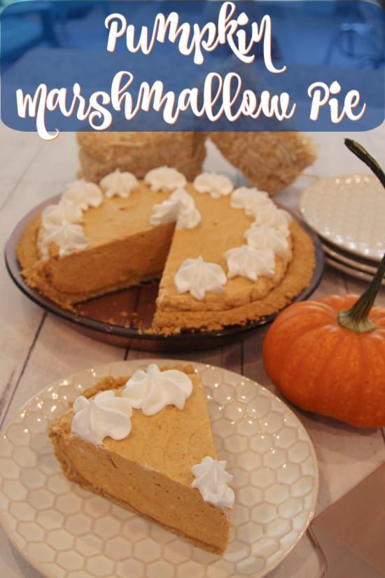 pumpkin marshmallow pie on a table with other desserts