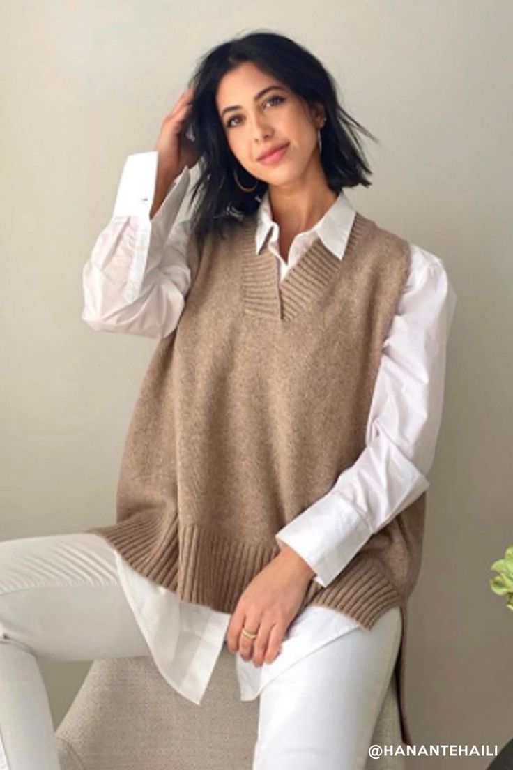 Lyla Oversized Knit Vest Enjoy newtro vibes! Featuring a super cozy wool blended knit material all over, a ribbed V-neck, an oversized fit, an asymmetric hem length silhouette, and pull on style * Product Specification Wool 55% Polyester 23% Nylon 22% * Flat Measurement: S/M: Shoulder: 32??(12.6in) / Bust: 65??(25.6in) / Length: 79??(31.1in) * Professional Clean OnlyModel's height is 5'7" (176cm) Bust 32in Waist 24in Hip 35in and wearing S/M Oversized Knitted Sweater For Work, Cozy V-neck Sweater Vest For Fall, Trendy Oversized Sweater Vest For Fall, Oversized Knit Sweater For Work, Fall Textured Knit Sweater Vest For Layering, Everyday Knit Sweater Vest For Fall, Everyday Fall Knit Sweater Vest, Fall Knit Sweater Vest For Everyday Wear, Oversized Soft Knit Sweater For Work