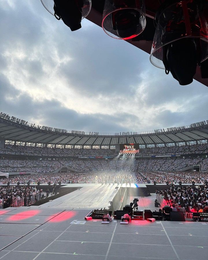 an empty stadium filled with lots of people