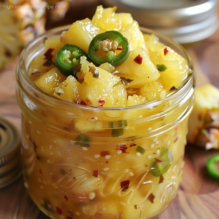 a glass jar filled with macaroni and cheese