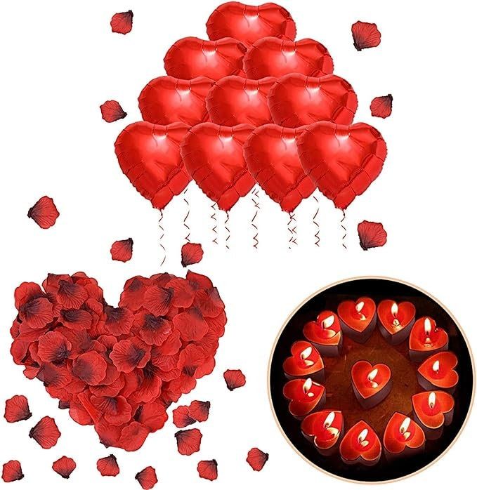 a bunch of red heart shaped balloons next to a chocolate cake with candles on it