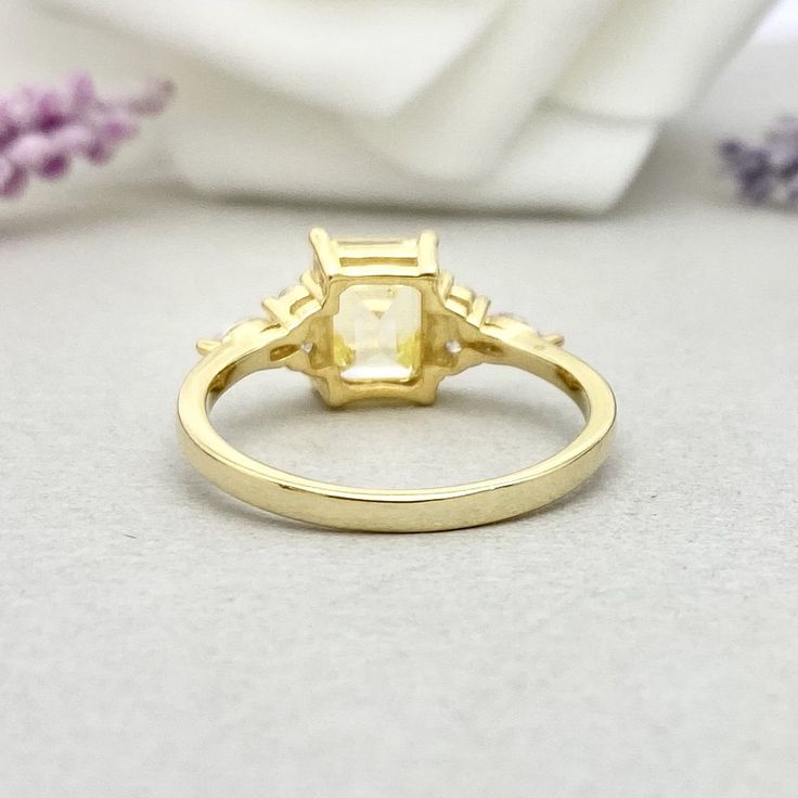 ITEM SPECIFICATIONS: Material: 14K Solid Yellow Gold ( 14K Solid Rose And White Gold Also Available) -The Main Stone Is An Emerald Cut 8mm by 6mm ( 1.50Ct ) Canary Yellow Simulated Diamond -Side Stones Are Marquise Cut 4x2mm Simulated Diamonds And Round 2mm Simulated Diamond -Ring Is Cast In Solid 14K Yellow Gold (14K Solid Rose And White Gold Also Available) -Total Face Height Of the Ring Measures 8mm -Band Width Measures Approximately 1.7mm -Please Message Us If You Need A Size That is Not Lis Wedding Rings With Citrine In Baguette Cut, Citrine Baguette Cut Wedding Rings, Baguette Cut Citrine Wedding Rings, Wedding Baguette Cut Topaz Ring With Accent Stones, Gold Citrine Birthstone Ring With Prong Setting, Gold Rings With Cubic Zirconia And Accent Stones, Gold Emerald Ring With Princess Cut And Prong Setting, Wedding Topaz Ring With Center Stone And Baguette Cut, Gold Emerald-cut Birthstone Ring For Anniversary