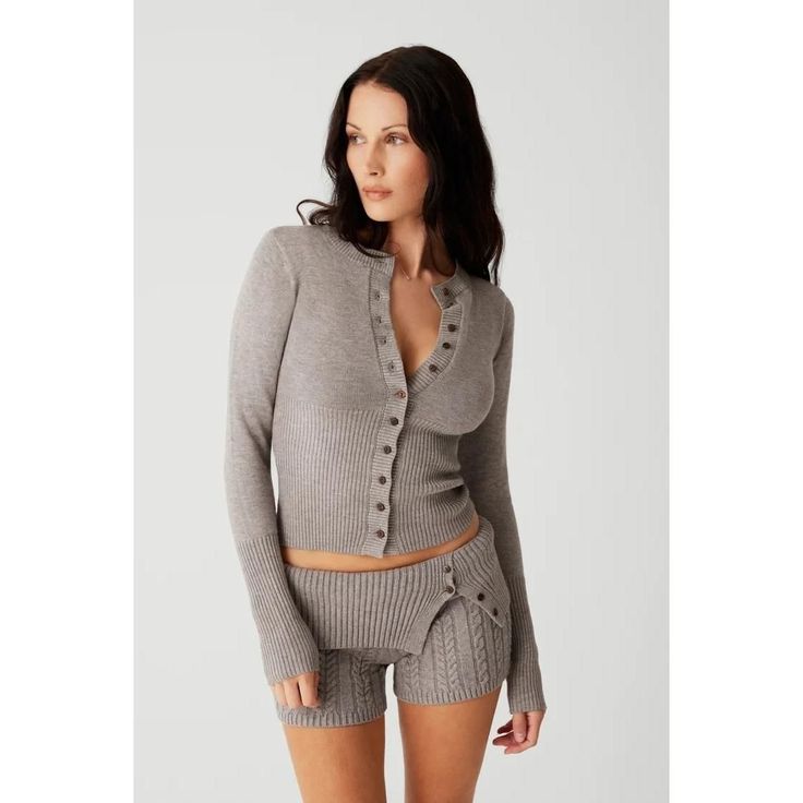 Discover Timeless Elegance and Comfort Step into a world of refined style and cozy warmth with our Women's Chic Slim-Fit Knitted Cardigan. Perfectly tailored to complement your every curve, this elegantly ribbed woolen sweater is a must-have for every fashion-conscious woman. Whether you're dressing up for a casual day out or a sophisticated evening event, this versatile cardigan is your go-to choice for a look that's as stylish as it is comfortable. Exceptional Features Flattering Slim Pattern: Elegant Ribbed Cardigan For Layering, Fitted Cashmere Cardigan For Loungewear, Elegant Fitted Ribbed Cardigan, Elegant Sweater For Fall Loungewear, Chic Fitted Ribbed Cardigan, Elegant Fall Sweater For Loungewear, Elegant Winter Sweater For Loungewear, Elegant Fine Knit Sweater For Loungewear, Elegant Fine Knit Loungewear Sweater