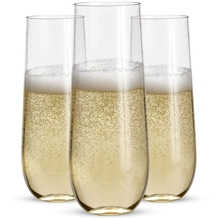 three wine glasses filled with champagne on a white background