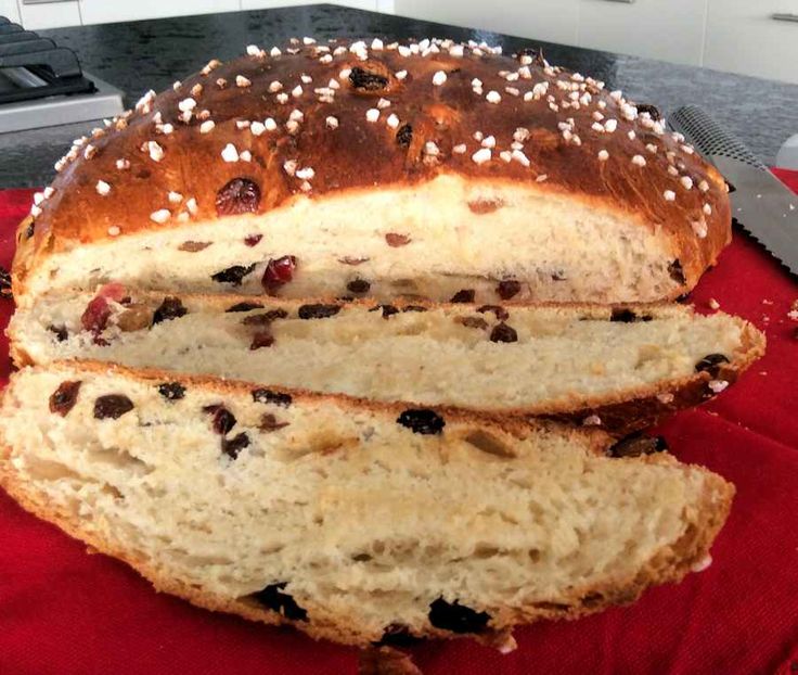 a loaf of bread sitting on top of a red cloth