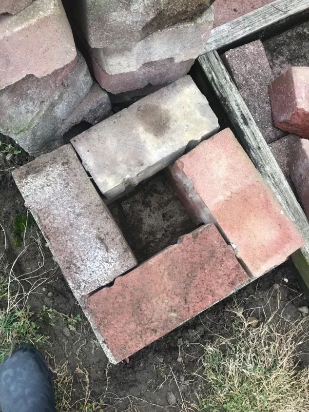 some bricks are laying on the ground