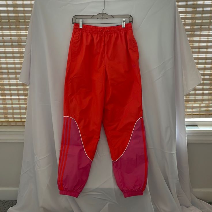 Fun Adidas Trackpants! New With Tags, Never Worn! Trendy Pink Parachute Pants For Spring, Pink High Waist Parachute Pants For Spring, Pink Sporty Sweatpants With Pockets, Trendy Pink Parachute Pants, Trendy Pink Relaxed Fit Sweatpants, Casual Pink Parachute Pants For Spring, Pink Parachute Pants With Pockets For Summer, Pink Athleisure Sweatpants With Pockets, Pink Stretch Parachute Pants With Elastic Waistband