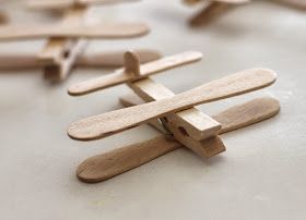 several wooden clothes pins laying on top of each other