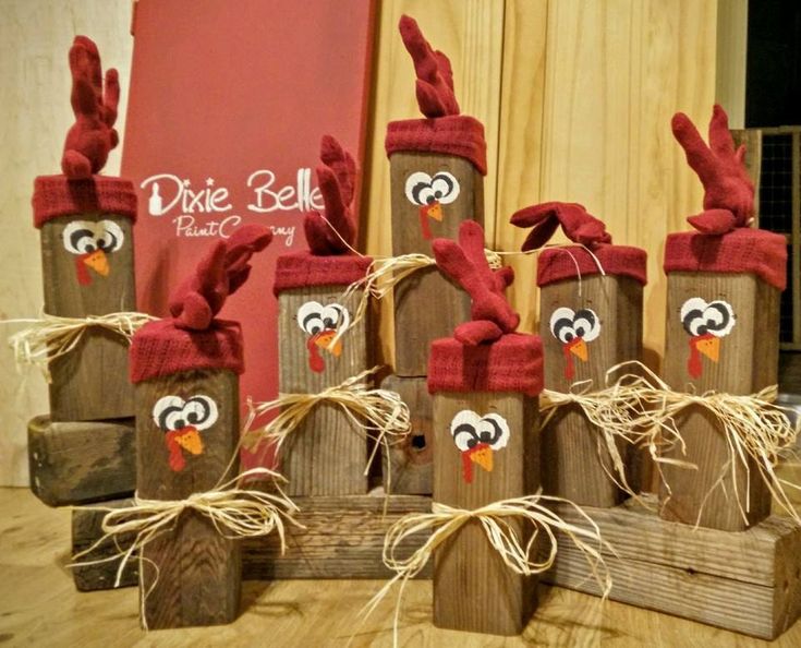 several wooden blocks decorated with red and white decorations