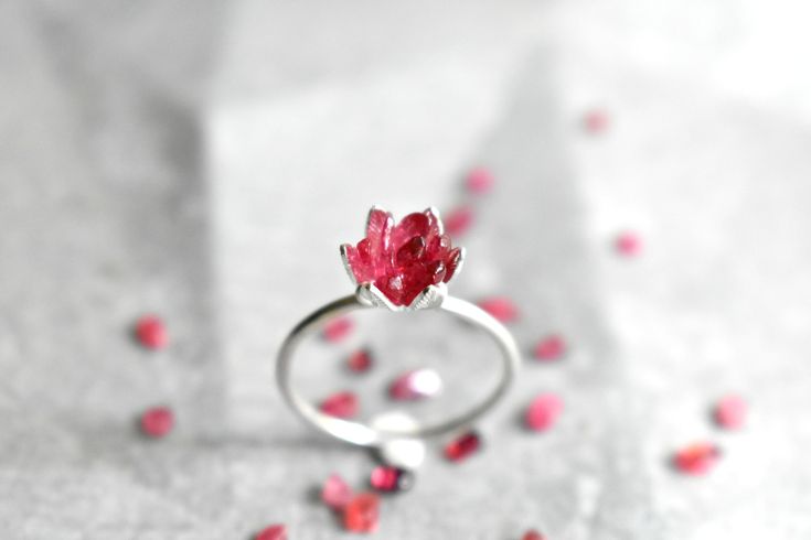 Spinel jewelry in 14K rose gold fill! Woweee I love this gemstone. A deep red Spinel gemstone lotus ring enveloped in pink gold. Spinel is known for its metaphysical energy renewal and vitality. It also closely relates to the Scorpio and Leo Zodiacs and also and August birthstone! Also called Ruby Spinel, it is the newest birthstone of August babies. Also available in sterling silver. This piece is ready to ship in a size 7. Or, hit the custom order button to have one made just for you, to size Spiritual Sterling Silver Rose Gold Rings, Sterling Silver Spiritual Rings In Rose Gold, Rose Gold Sterling Silver Spiritual Rings, Spiritual Sterling Silver Rings In Rose Gold, Spiritual Rose Gold Sterling Silver Rings, Minimalist Ruby Jewelry As A Gift, Minimalist Ruby Jewelry As Gift, Minimalist Red Jewelry For Wedding, Red Minimalist Jewelry For Wedding