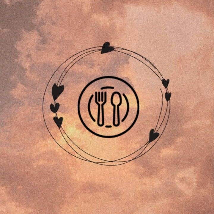 the silhouette of a fork, knife and heart - shaped utensils against a cloudy sky