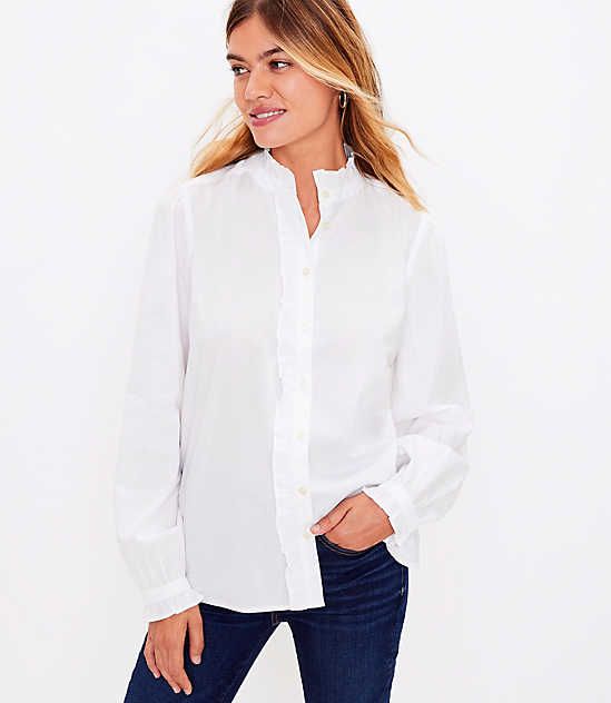 A ruffled neck and puffed shoulders pretty up this effortlessly and eternally polished shirt. Standing collar. Button front. Long sleeves with button cuffs. Shirttail hem. Loft Ruffle Shirt Size XL White Women's by Loft Size Regular - XL White Women's Long, Sleeve, Shirts, Tops, 55%, Cotton, 45%, Modal, Machine, Washable Elegant Ruffled Button-up Shirt, Elegant Button-up Tops With Ruffles, Elegant Button-up Ruffled Tops, Elegant Ruffled Button-up Tops, Feminine Tops With Button Cuffs For Daywear, Classic Puff Sleeve Shirt With Relaxed Fit, Classic Shirt With Puff Sleeves In Relaxed Fit, Workwear Top With Ruffled Collar And Buttons, Elegant Workwear Shirt With Ruffled Collar