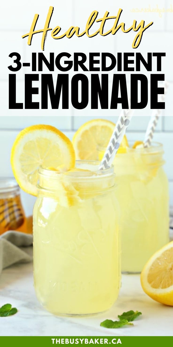 two mason jars filled with lemonade on top of a counter