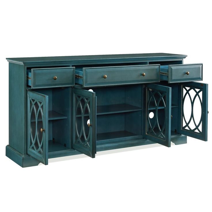 the sideboard is painted blue and has two doors open to reveal an area for storage