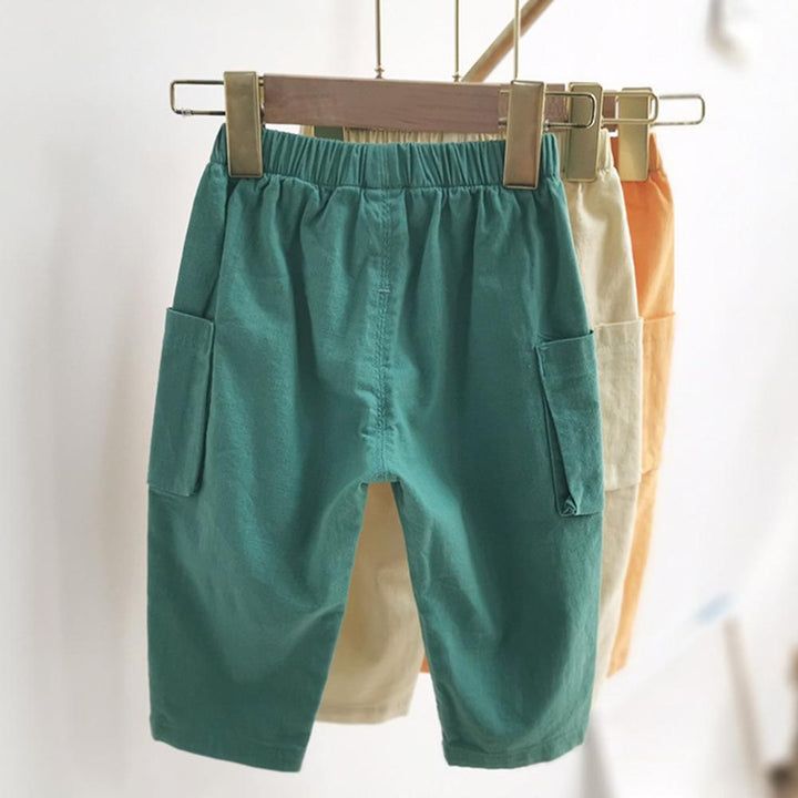 Boys Casual Solid Pocket Trousers Wholesale Boys Clothing Suppliers – PrettyKid Casual Cotton Sweatpants For Playtime, Playful Elastic Waistband Pants, Playful Green Pants With Elastic Waistband, Playful Spring Bottoms With Pockets, Cotton Pants With Elastic Waistband For Playtime, Casual Pants With Elastic Waistband For Playtime, Casual Cotton Leggings With Pockets, Green Non-stretch Cotton Cargo Pants, Spring Bottoms With Elastic Waistband For Playtime