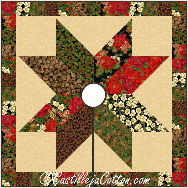 a quilted star with red and green flowers on the center, surrounded by white daisies