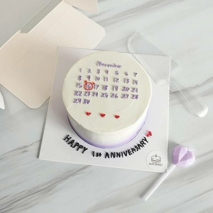 a white cake sitting on top of a table