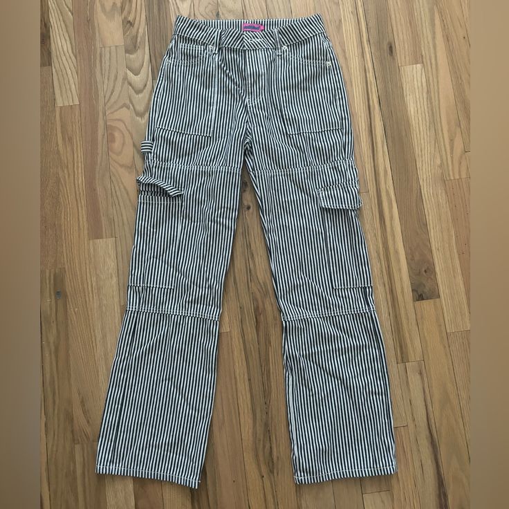 Pinstripe Cargo Pants Are Completely New And Never Worn Before. These Pants Are So Good To Style Up Or Down. They Are More Mid Rise But U Can Wear Them Low Rise. They Fit More Of A Xs/S. They Have No Rips Or Stains And Are In Perfect Condition. #Edikted #Cargopants #Pinstripe #Blackandwhite #Stripes #Y2k #Streetstyle #Preppy #Garage #Pacsun #Brandymelville #Zara #Princesspolly #Whitefox #Iamgia #Black #White Striped Straight Leg Pants For Streetwear, Casual High Waist Pinstripe Pants, Striped Pants With Pockets For Streetwear, Striped Straight Leg Bottoms For Streetwear, Casual Pinstripe Pants With Pockets, Trendy High Waist Striped Pants, Trendy Striped Long Pants, Trendy Trousers With Vertical Stripes, Trendy High-waist Striped Pants