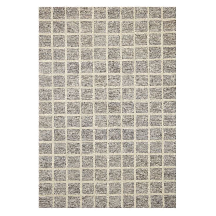 a gray and white rug with squares on it