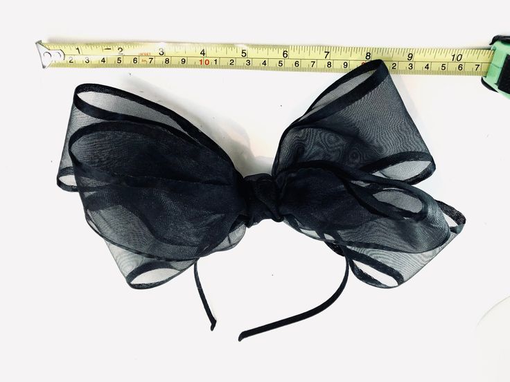 Black bow Fascinator - Bow Wedding Headpiece -chiffon and satin bow- Kentucky derby- Big bow Headband Hi, This triple bow headband has a handmade 4 inch chiffon with black satin edge. 10 inches long. It's sprayed with stiffener to hold its shape. Colors: Black Navy It's all placed on a 1/8 inch covered headband. This covered headband fits any head size and very comfortable. Plus no headaches! Pick a headband that matches Your hair color so it blends in. Light weight! For all ages...5 to 85 I am Black Bow Tie For Summer Party, Decorative Bow Headband For Party, Adjustable Bow Fascinator For Formal Occasions, Elegant Party Headband With Decorative Bow, Party Headband With Bow Tie, Party Hair Accessories Headband With Bow, Black Formal Hair Accessories For Summer, Party Headband With Satin Bow, Satin Bow Headband For Party