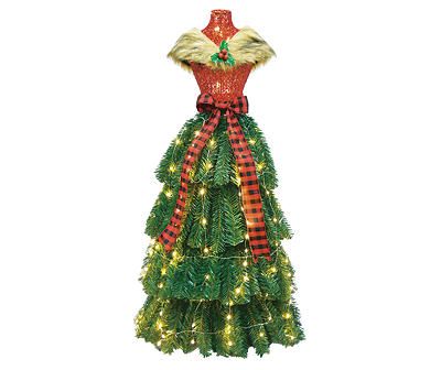 a dress made out of christmas trees with red and green bows on it's neck