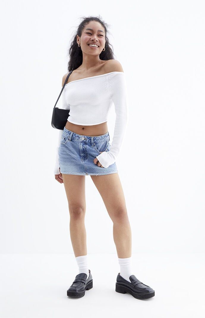 A little edgy and a little classic, the Light Indigo Low Rise Denim Mini Skirt from PacSun offers the best of both worlds. Crafted from sustainably sourced cotton for an eco-friendly update, this low-rise mini skirt features a 5-pocket body, a fold-over raw-cut hem, and a flattering mini length. 12.5" center front lengthLight indigo washRigid fabricLow-rise5-pocket bodyZip fly closureFold-over raw-cut hemPacSun back label100% sustainably sourced cottonMachine washableModel is wearing a size 26Mo Short Denim Skirts, Jean Skirt Aesthetic, Low Rise Mini Skirt, Trendy Light Wash Mid-rise Mini Skirt, Mini Jean Skirt, Denim Skirts, Mid-rise Light Wash Cotton Mini Skirt, Pacsun Mini Skirt, Mid-rise Denim Blue Mini Skirt