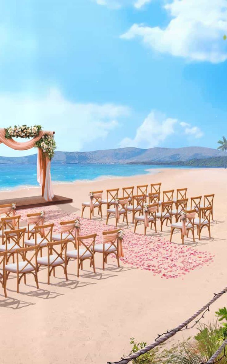 an outdoor wedding set up on the beach with chairs and flowers in front of it