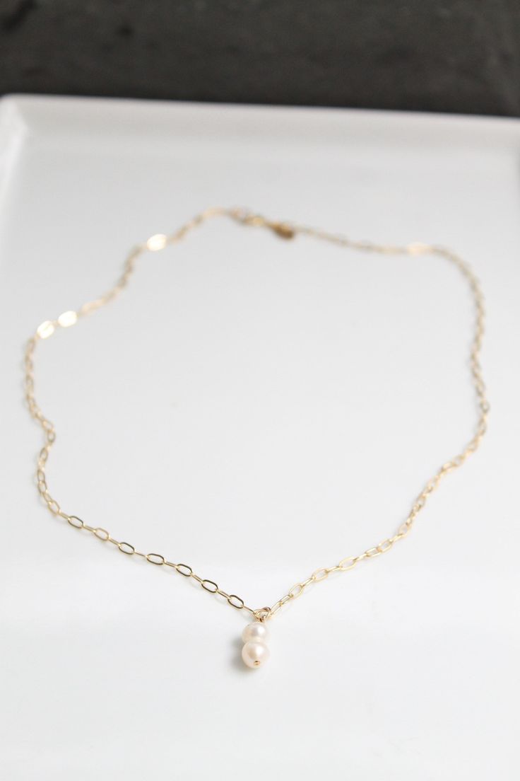 14k gold paperclip chain with freshwater Pearl please add in notes if you would like the necklace with 1 or 2 pearls Delicate 14k Gold-filled Paperclip Chain Jewelry, Delicate 14k Gold Filled Paperclip Chain Jewelry, Delicate 14k Gold Necklace With Paperclip Chain, Minimalist 14k Gold Filled Paperclip Chain Jewelry, Dainty 14k Gold Filled Jewelry With Pearl Charm, Simple Paperclip Chain Necklace As Gift, Everyday 14k Gold Filled Jewelry With Pearl Pendant, Simple Paperclip Chain Necklace Gift, 14k Gold-filled Delicate Paperclip Chain Jewelry