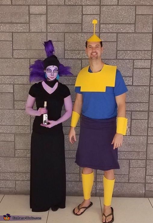 two people in costumes standing next to each other