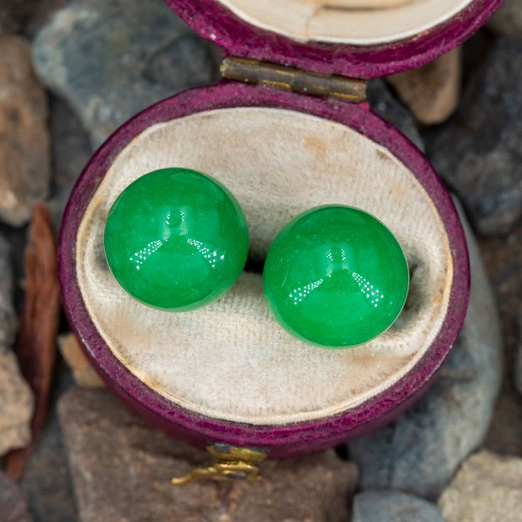 This dyed jade necklace and earring set features a necklace with a single jade bead that slides and jade spheres of the same size for the stud earrings. The chain on the necklace is 18 inches long and the earrings are finished with friction backs for pierced ears. The set is crafted in 14k yellow gold. We have a few sets available. Formal Jade Gemstone Jewelry, Classic Jade Jewelry For May Birthstone, Classic Jade Jewelry With Matching Earrings, Fine Jade Jewelry For Formal Occasions, Classic Green Jade Jewelry, Formal Round Jade Jewelry, Classic Round Jade Jewelry, Formal Jade Jewelry With Round Beads, Formal Jade Jewelry With Matching Earrings