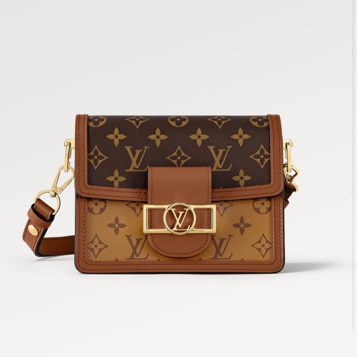 Comes With Dust Bag And Bag , New With Plastic Stickers On Gold Parts . Brown Monogram Canvas Square Shoulder Bag, Square Brown Monogram Canvas Shoulder Bag, Light Luxury Brown Shoulder Bag With Gold-tone Hardware, Luxury Monogram Canvas Square Shoulder Bag, Brown Monogram Canvas Box Bag With Detachable Strap, Luxury Brown Shoulder Bag With Branded Hardware, Elegant Square Monogram Canvas Shoulder Bag, Light Luxury Brown Shoulder Bag For Evening, Luxury Shoulder Bag With Branded Hardware And Flap