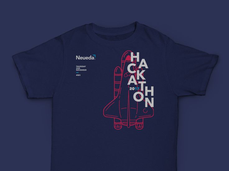 the back of a navy blue t - shirt with an image of a rocket ship