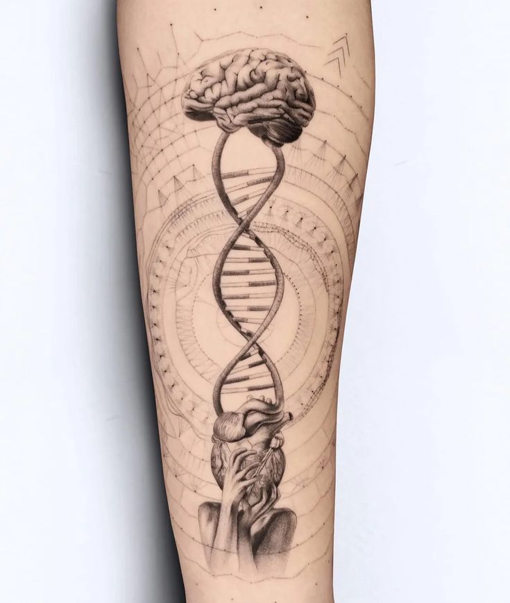 a tattoo on the leg of a woman with a drawing of a double - stranded human