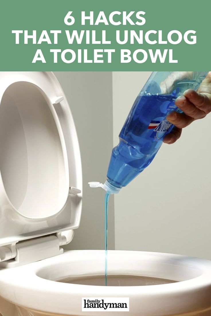 someone is pouring blue liquid into a toilet