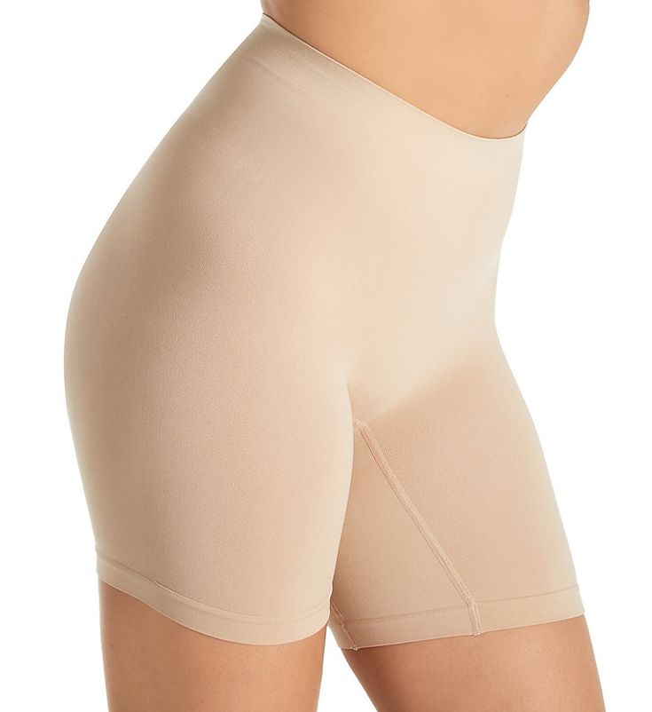 Designed for a seamless fit and full coverage under clothing, this slip short is the perfect solution for a smooth look. Made from nylon and spandex. Wide, double-layer rib-knit waistband keeps the top in place. High rise provides more tummy coverage. Crotch gusset panel guides the fit for no gaps between the legs. Designed for light, all over smoothing. Seamless rear. Long legs have wide, seamless hems to prevent roll up. Protects against inner thigh chafing. Ribbed knit zone at crotch for brea Shaping Shapewear Seamless Shorts, Seamless Compression Shapewear Mid-thigh Length, Seamless Shaping Shapewear Mid-thigh Length, Seamless Compression Shapewear, Mid-thigh Length, Seamless Shaping Shapewear Short Length, Seamless Shaping Shapewear In Short Length, Shapewear Seamless Biker Shorts, Seamless Mid-thigh Shapewear, Seamless Short Length Shaping Shapewear