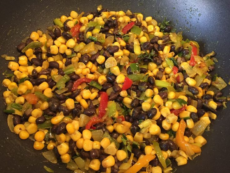 corn and black beans in a frying pan